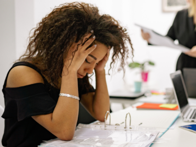 Stressed out woman has burnout at her job